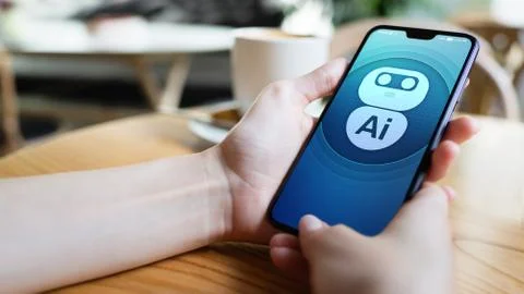 AI Artificial intelligence Deep machine learning concept. Robot icon on mobile Stock Photos