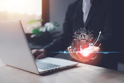 AI (Artificial intelligence) growing concept. Businessman hand typing keybo.. Stock Photos