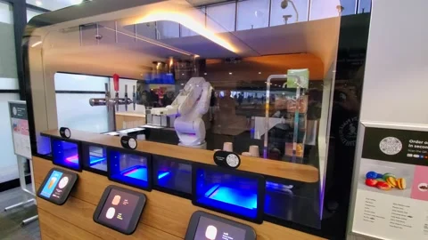 AI Artificial Intelligence Robot replace humans and serving coffee at San Stock Footage 231273935