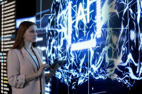 AI automation, tablet and engineer approving AI agent modifications Stock Photos