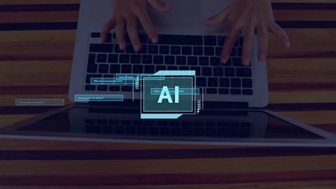 AI badge appearing, causing hands to type on laptop, animating chat boxes and Stock Footage 334768402
