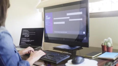 AI chat bot, Programmer use generative artificial intelligence for software   Stock Footage 286223225