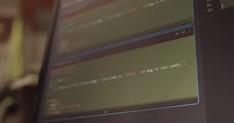 AI chat in IDE generating a C++ code for videogame. Modern programming footage. Stock Footage 310856573