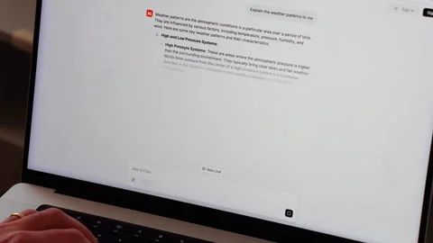 AI chatbot answer on weather patterns on laptop screen Stock Footage 302189432