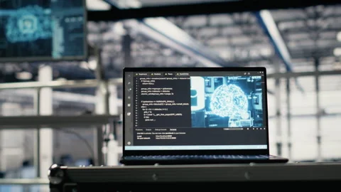 AI coding script running on laptop managing server farm mainframes Stock Footage 314685502