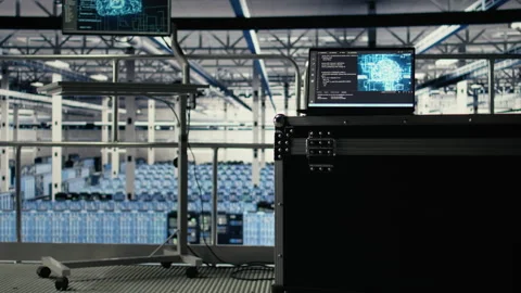 AI coding script running on laptop managing server farm mainframes Stock-Footage 314803738