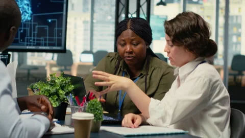 AI company software developers discussing tech roadmap Stock Footage 323331958