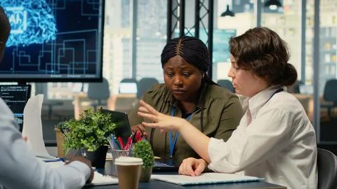 AI company software developers discussing tech roadmap Stock Photos