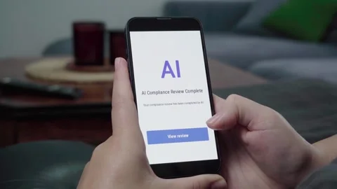 AI Compliance Review Complete Notification on Phone in Cozy Living Room Stock Footage 343971426