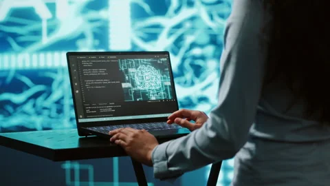 AI computer scientist using laptop for business data analysis in high tech Stock Footage 278697259