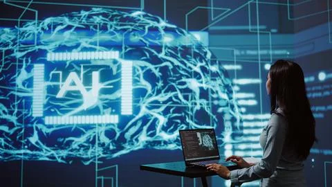 AI computer scientist using laptop for business data analysis in high tech Stock Photos