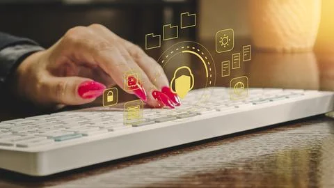 AI customer support and cybersecurity concept. Woman typing on keyboard with  Stock Photos