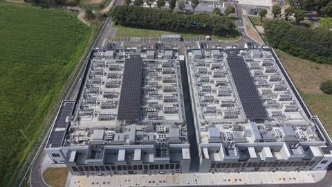 AI Data Center Construction Aerial View and Digital Infrastructure Stock Footage 345895688
