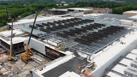 Ai Data center rooftop under construction in Lancaster reveals dense rows of Stock Footage 337529241