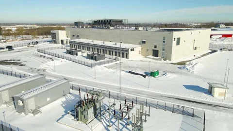 AI Data Center With Transformers and Cooling Systems Revealed by Ascending Drone Stock Footage 331444319