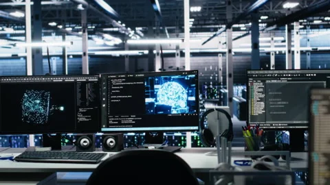 AI development workstations in data center displaying machine learning code Stock Footage 313637968