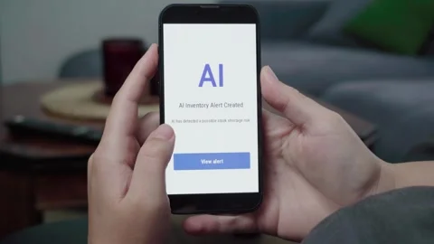AI Inventory Shortage Alert Notification on Phone in Home Setting Stock Footage 343971657