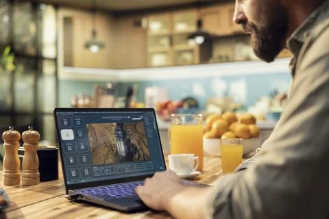 AI-powered application on laptop, generate images from text scripts Stock Photos