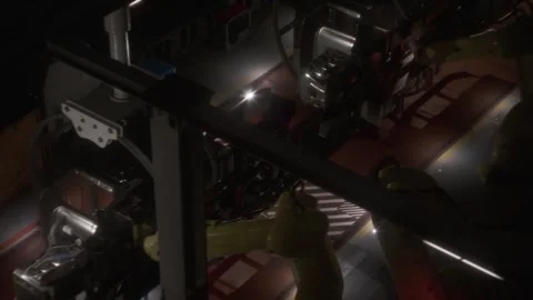 AI Powered Robotic Arms Assembling Machinery in a Modern Factory Stock Footage 290336645