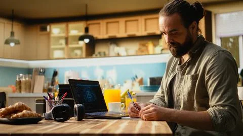 AI-powered software next to remote worker on laptop with artificial intelligence Stock Photos