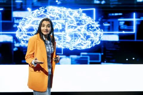 AI presenter engaging audience during technology keynote Stock Photos