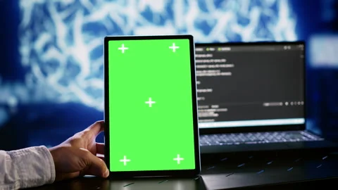AI script coding on chroma key tablet Stock Footage 249562531