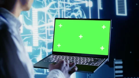 AI script coding on chroma key laptop Stock Footage 251592408