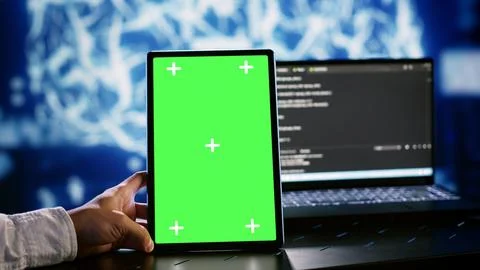 AI script coding on chroma key tablet Stock Photos