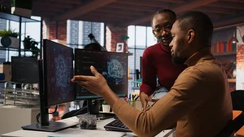 AI software development agency staff members collaborating Stock Photos