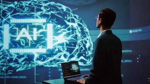 AI system administrator using laptop device in high tech futuristic workspace Stock Footage 278623028