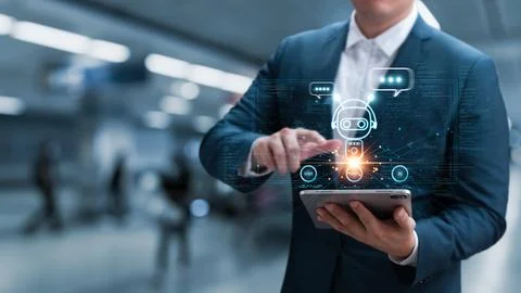 AI technology chatbot, businessman using tablet to communicate with AI and .. Stock Photos