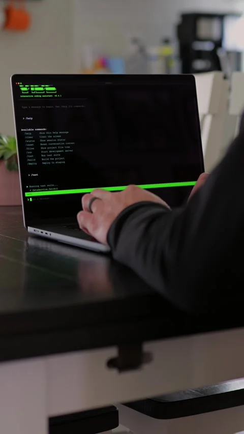 AI Vibe Coder Builds Billion Dollar Apps at Home Stock Footage 332567683