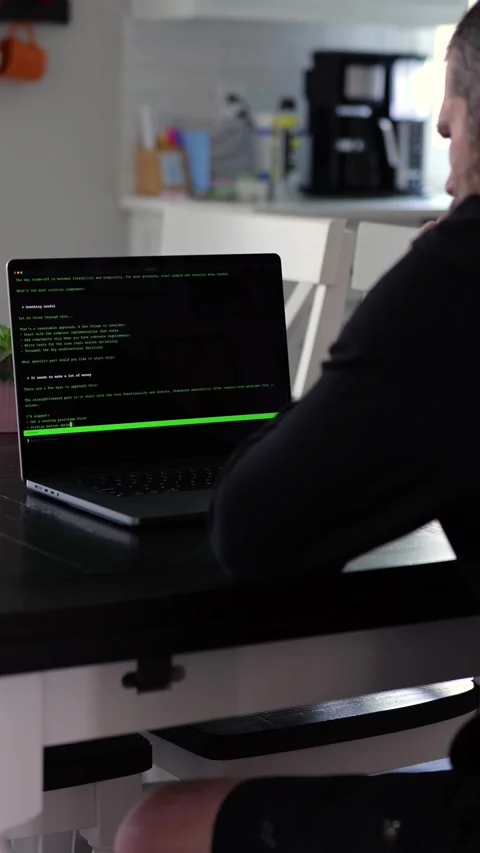 AI Vibe Coder Builds Billion Dollar Apps at Home Video stock 332567687