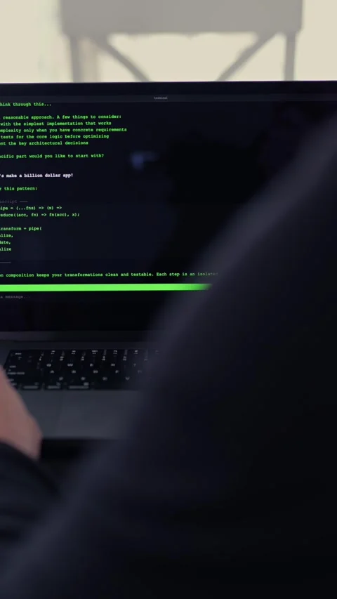AI Vibe Coder Builds Billion Dollar Apps at Home Stock Footage 332567690