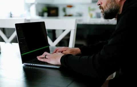 AI Vibe Coder Builds Billion Dollar Apps at Home Stock Photos