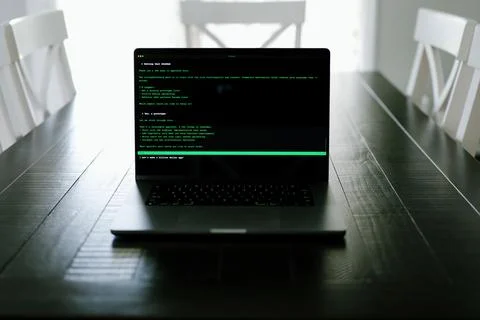 AI Vibe Coder Builds Billion Dollar Apps at Home Stock Photos