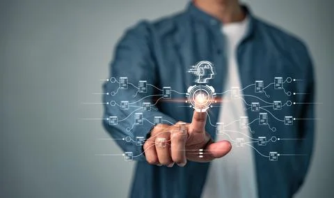 AI is visualized with a human hand touching a glowing digital interface, co.. 스톡 사진