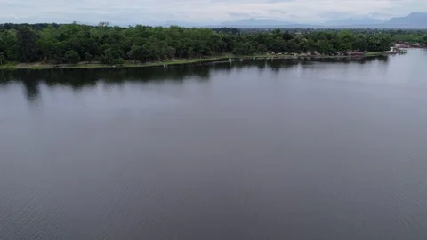 Aiborne view of lake with mountains Stock Footage 329929677