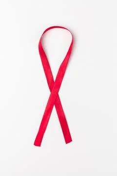 AIDS red ribbon on a white background. Stock Photos