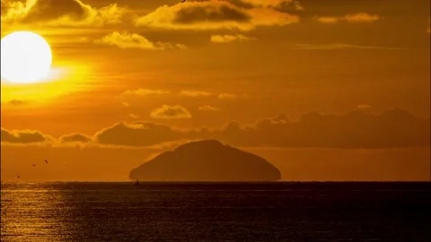The Ailsa Craig at sunset Stock Footage 146244116