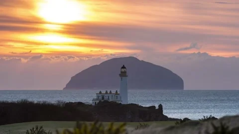 The Ailsa Craig &amp; Turnberry lighthouse Stock Footage 148395030
