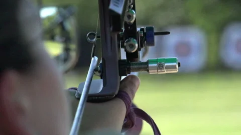 Aiming during olympic archery target practice, close up slow motion shot Stock Footage 148646135