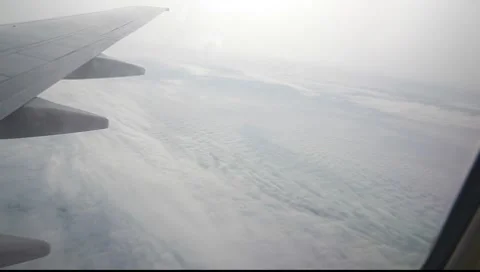 Aiplain and Clouds Stock-Footage 7908069