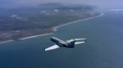 Air-to air view of executive jet from behind Stock Footage 59475419