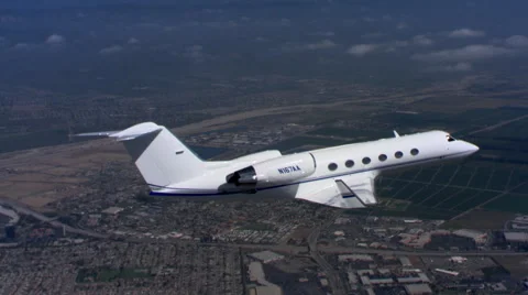 Air-to-air view of executive jet from close-up to zoom-out Stock Footage 59475475