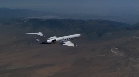 Air-to-air view of executive jet from rear Stock Footage 59476052