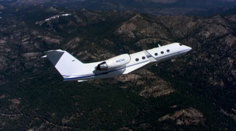 Air-to-air view of executive jet at close range Stock Footage