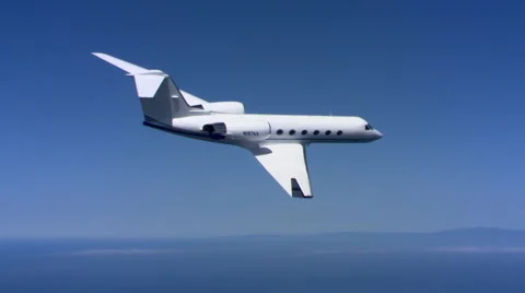 Air-to-air view of Jet beginning descent Stock Footage 59475365