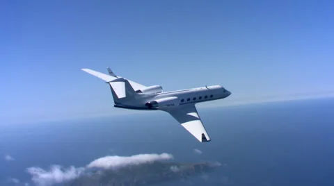 Air-to-air view of Jet over island chain Stock Footage 59475309