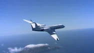 Air-To-Air View Of Jet Over Island Chain Stock Footage